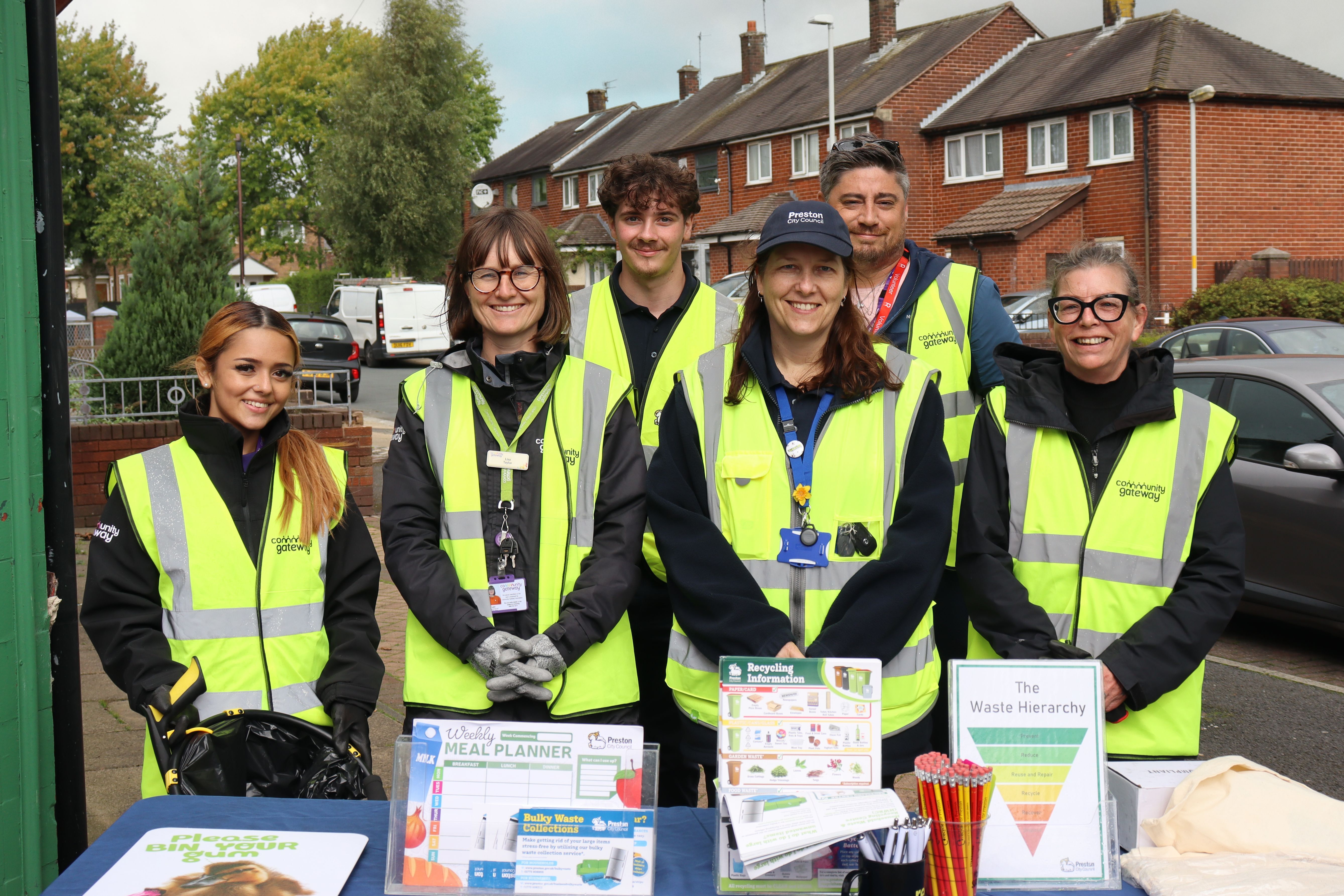 A group of people wearing hi-vis