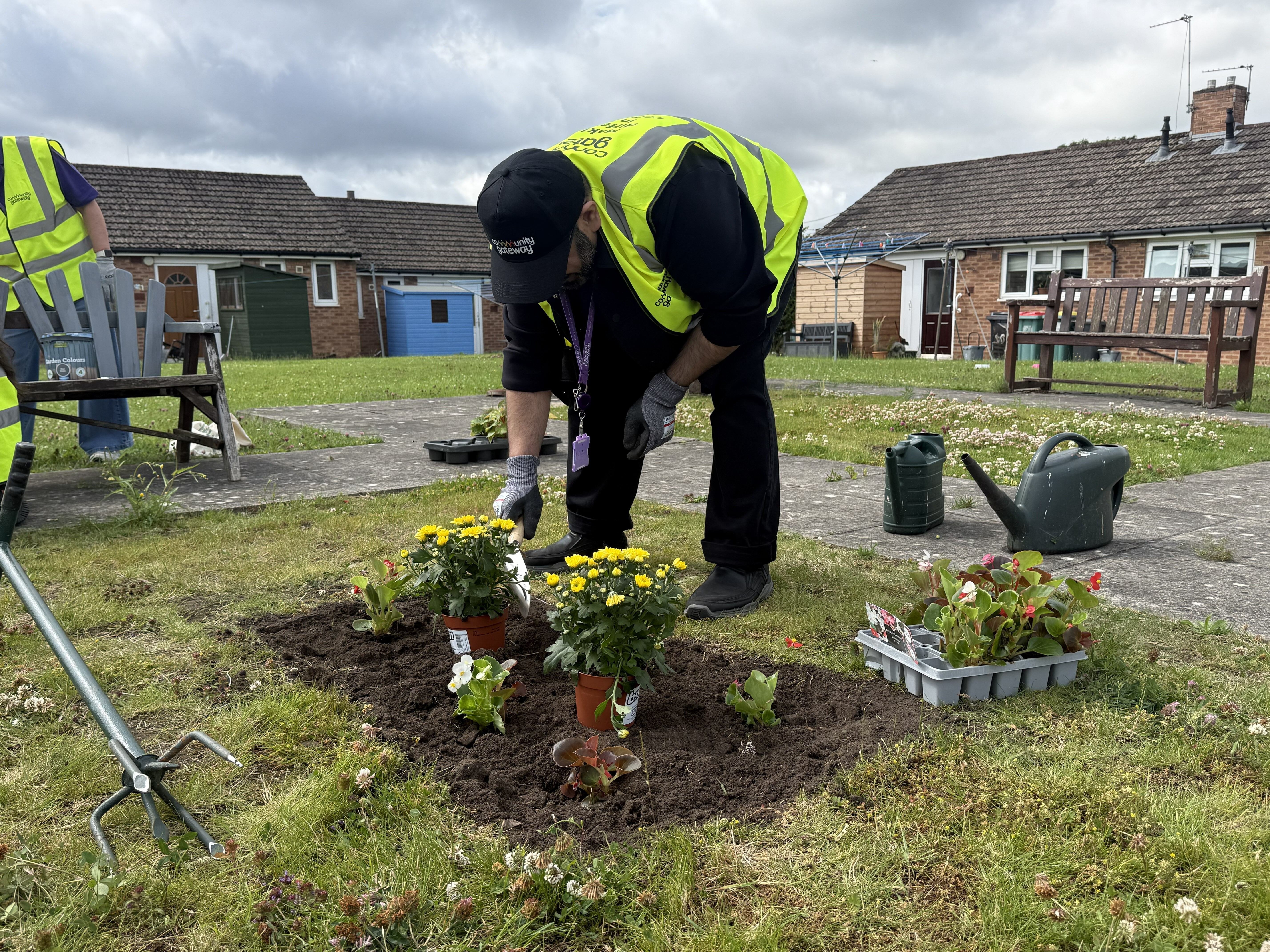 CGA colleague planting flowers