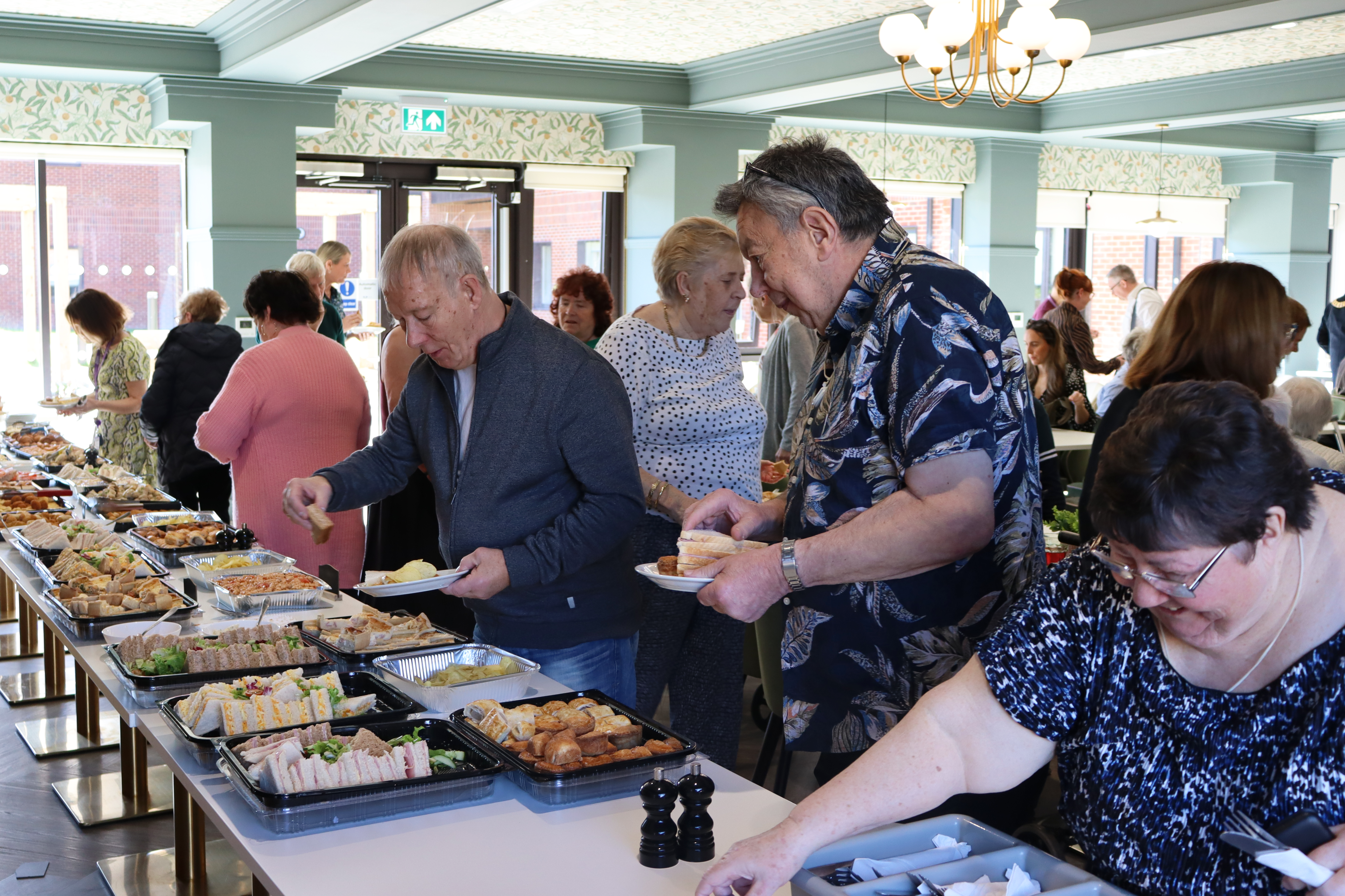 Residents at The Atrium at the scheme's birthday celebration