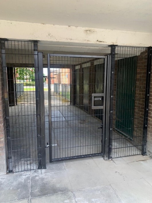The two gates secured to each end of the underpass