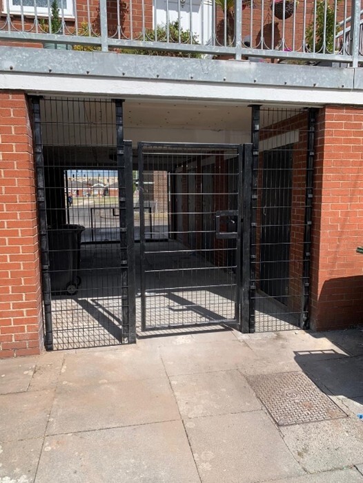 The two gates secured to each end of the underpass