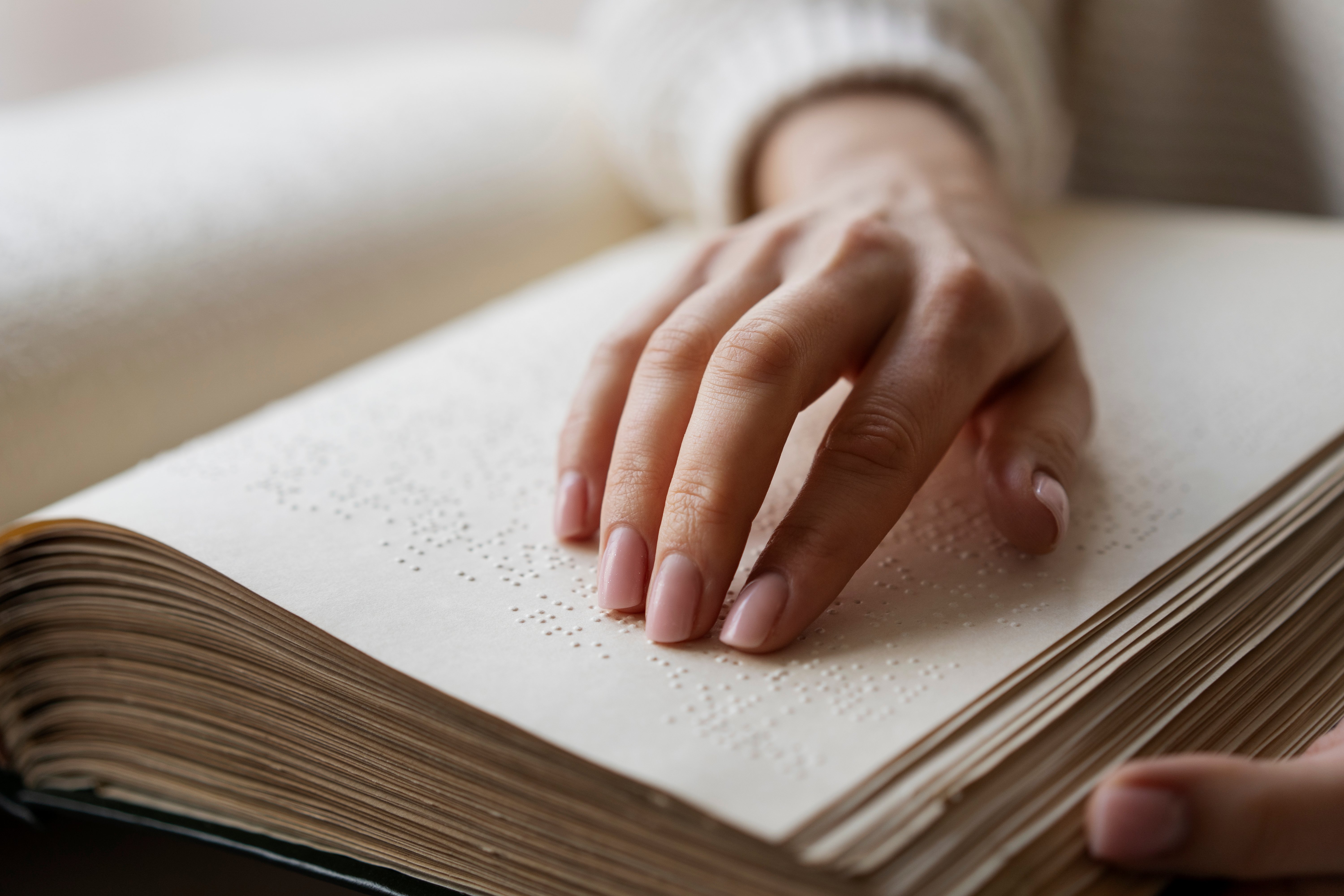 blind-person-reading-home