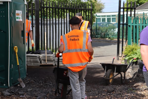 Picture of Community payback carrying out the works 