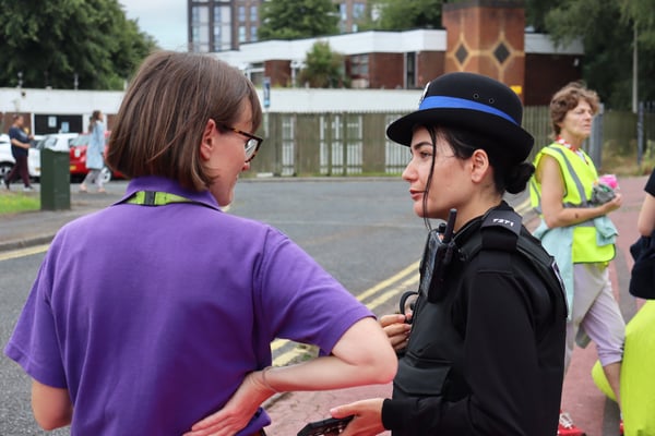 Engagement officer from CGA talking to a PCSO