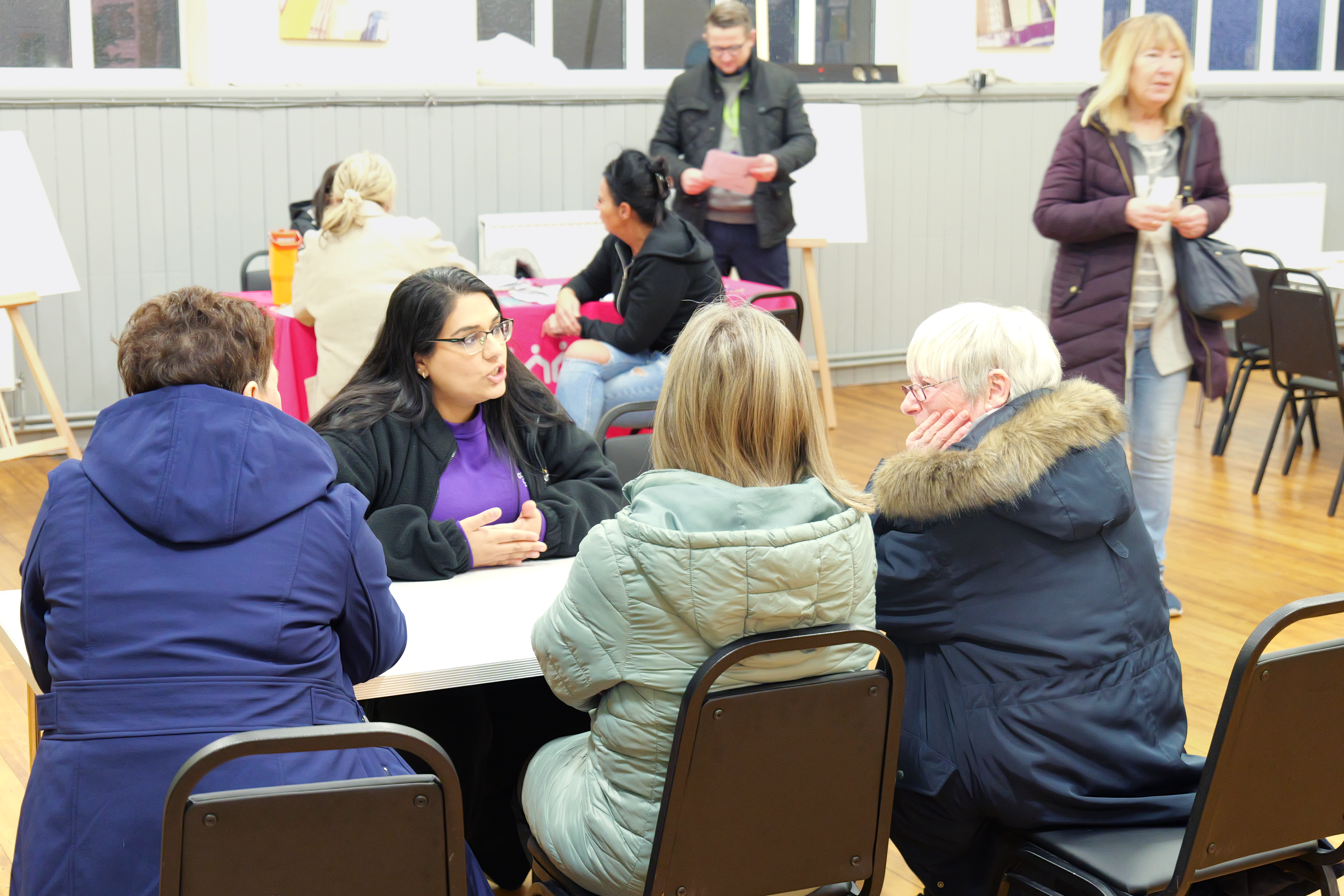 A group talking to a colleague of Community Gateway.