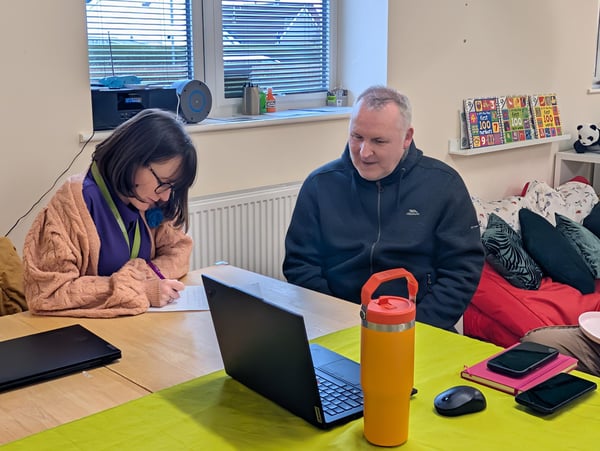 colleague and tenant filling out a survey